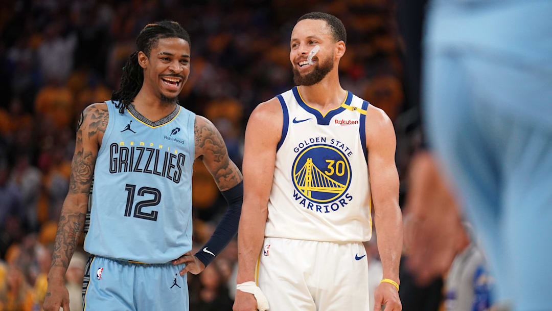 Apr 15, 2025; San Francisco, California, USA; Memphis Grizzlies guard Ja Morant (12) talks with Golden State Warriors guard Stephen Curry (30) in between free throw by Curry in the fourth quarter at the Chase Center. Mandatory Credit: Cary Edmondson-Imagn Images