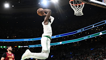 Oct 12, 2025; Boston, Massachusetts, USA; Boston Celtics guard/forward Jaylen Brown (7) dunks and scores against the Cleveland Cavaliers during the first half at TD Garden. Mandatory Credit: Brian Fluharty-Imagn Images