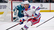 Mar 29, 2025; San Jose, California, USA; New York Rangers center Vincent Trocheck (16) skates with the puck against San Jose Sharks goaltender Alexandar Georgiev (40) during the first period at SAP Center at San Jose. Mandatory Credit: Robert Edwards-Imagn Images