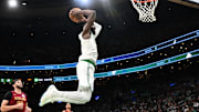 Oct 12, 2025; Boston, Massachusetts, USA; Boston Celtics guard/forward Jaylen Brown (7) dunks and scores against the Cleveland Cavaliers during the first half at TD Garden. Mandatory Credit: Brian Fluharty-Imagn Images