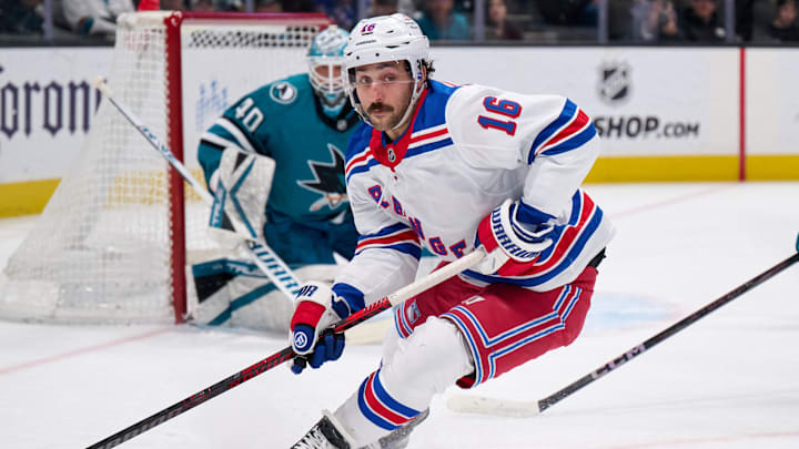 Mar 29, 2025; San Jose, California, USA; New York Rangers center Vincent Trocheck (16) skates with the puck against San Jose Sharks goaltender Alexandar Georgiev (40) during the first period at SAP Center at San Jose. Mandatory Credit: Robert Edwards-Imagn Images