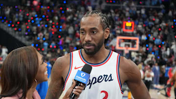 Mar 9, 2025; Inglewood, California, USA; FanDuel reporter Kristina Pink (left) interviews LA Clippers forward Kawhi Leonard (2) after the game against the Sacramento Kings at the Intuit Dome. Mandatory Credit: Kirby Lee-Imagn Images