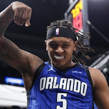 Apr 15, 2025; Orlando, Florida, USA; Orlando Magic forward Paolo Banchero (5) reacts after basket against the Atlanta Hawks in the fourth quarter at Kia Center. Mandatory Credit: Nathan Ray Seebeck-Imagn Images