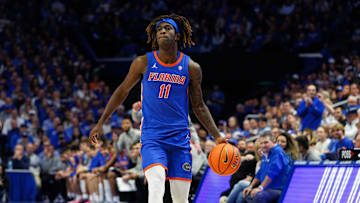 Jan 4, 2025; Lexington, Kentucky, USA; Florida Gators guard Denzel Aberdeen (11) handles the ball during the first half against the Kentucky Wildcats at Rupp Arena at Central Bank Center. Mandatory Credit: Jordan Prather-Imagn Images