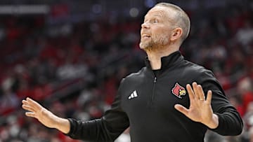 Nov 3, 2025; Louisville, Kentucky, USA;  Louisville Cardinals head coach Pat Kelsey calls out instructions during the first half against the South Carolina State Bulldogs at KFC Yum! Center. Mandatory Credit: Jamie Rhodes-Imagn Images