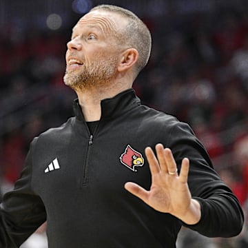 Nov 3, 2025; Louisville, Kentucky, USA;  Louisville Cardinals head coach Pat Kelsey calls out instructions during the first half against the South Carolina State Bulldogs at KFC Yum! Center. Mandatory Credit: Jamie Rhodes-Imagn Images