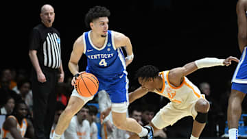 Kentucky Wildcats guard Koby Brea dribbles the ball against Tennessee Volunteers guard Jordan Gainey