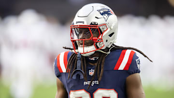 Dec 15, 2024; Glendale, Arizona, USA; New England Patriots running back JaMycal Hasty (39) against the Arizona Cardinals at State Farm Stadium. Mandatory Credit: Mark J. Rebilas-Imagn Images