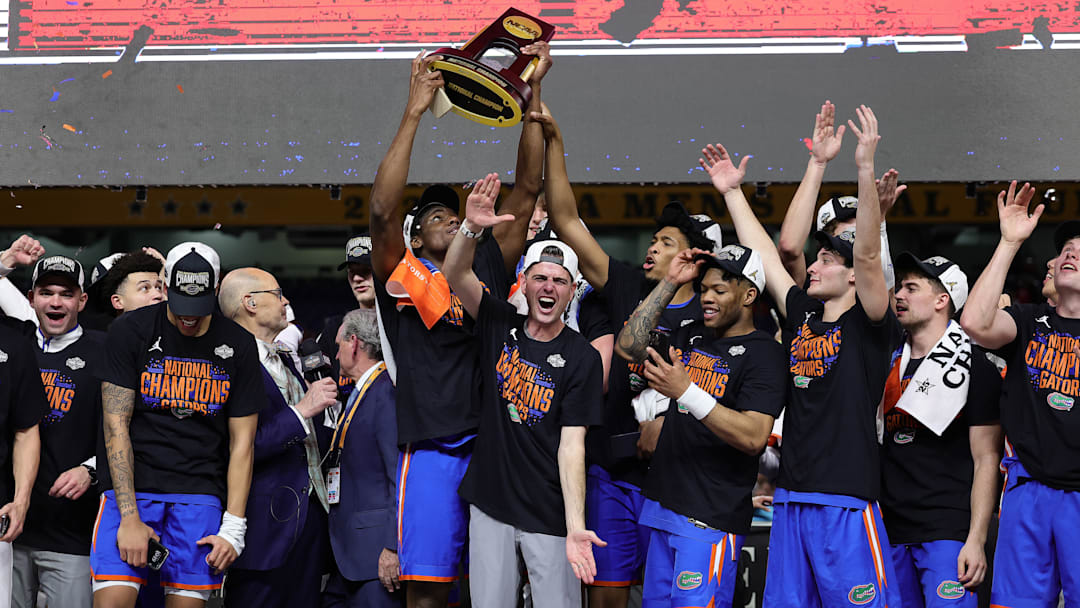 The Florida Gator basketball team celebrates its NCAA National Championship after beating Houston in the title game.