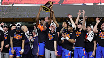 The Florida Gator basketball team celebrates its NCAA National Championship after beating Houston in the title game.