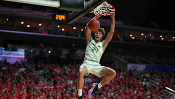 Storm Lake junior Jaidyn Coon dunks the basketball against ADM during the Iowa high school boys state basketball tournament on Monday, March 10, 2025, at Wells Fargo Arena in Des Moines. Mandatory Credit: Bryon Houlgrave-The Des Moines Register