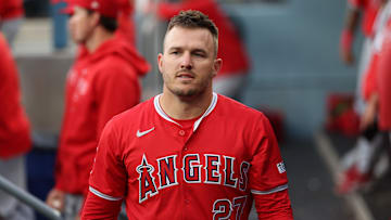 Mar 24, 2024; Los Angeles, California, USA; Los Angeles Angels center fielder Mike Trout (27) walks in the dugout during the game against the Los Angeles Dodgers at Dodger Stadium. Mandatory Credit: Kiyoshi Mio-Imagn Images