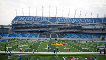 A view from the east stands show players during their first practice inside David Booth Kansas Memorial Stadium on Aug. 1, 2025.