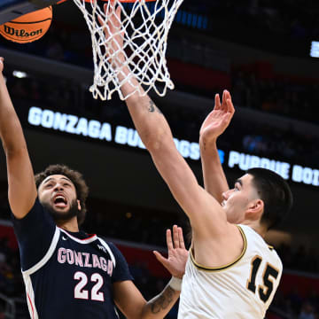 Mar 29, 2024; Detroit, MN, USA; Gonzaga Bulldogs forward Anton Watson (22) shoots the ball over Purdue Boilermakers center Zach Edey (15) in the second half during the NCAA Tournament Midwest Regional at Little Caesars Arena. Mandatory Credit: Lon Horwedel-USA TODAY Sports