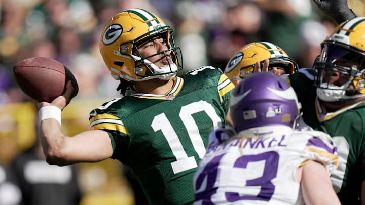 Green Bay Packers quarterback Jordan Love (10) throws a 42-yard pass to wide receiver Dontayvion Wicks during the fourth quarter of their game Sunday, September 29, 2024 at Lambeau Field in Green Bay, Wisconsin. The Minnesota Vikings beat the Green Bay Packers 31-29.