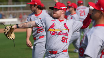 Feb 17, 2025; Jupiter, FL, USA;  St. Louis Cardinals outfielder Nathan Church (91) warms up during spring training. Mandatory Credit: Jim Rassol-Imagn Images