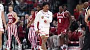 Jan 19, 2024; Madison, Wisconsin, USA; Wisconsin Badgers guard Kamari McGee (4) celebrates a Wisconsin Badgers basket against the Indiana Hoosiers during the second half at the Kohl Center. Mandatory Credit: Kayla Wolf-Imagn Images