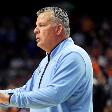 Mar 22, 2025; Lexington, KY, USA;  Creighton Bluejays head coach Greg McDermott reacts during the first half against the Auburn Tigers in the second round to the NCAA Tournament at Rupp Arena. Mandatory Credit: Jordan Prather-Imagn Images