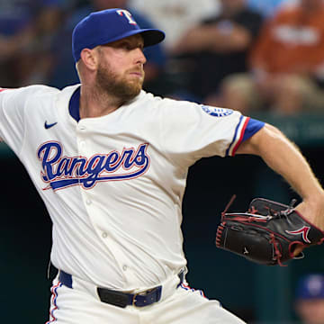 Sep 10, 2025; Arlington, Texas, USA; Texas Rangers pitcher Merrill Kelly throws a pitch against the Milwaukee Brewers at Globe Life Field. Mandatory Credit: Jim Cowsert-Imagn Images