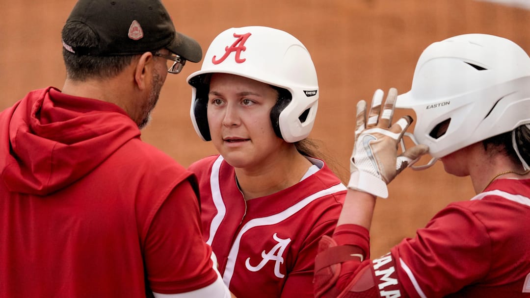 Mar 16, 2025; Tuscaloosa AL, USA; Alabama coach Patrick Murphy talks with hitter Alexis Pupillo during the game with Mississippi State. The Bulldogs defeated Alabama 4-3 Sunday to claim the series two games to one.