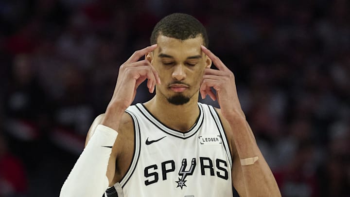 Apr 26, 2026; Portland, Oregon, USA; San Antonio Spurs forward Victor Wembanyama (1) encourages a teammate to be smart during the second half against the Portland Trail Blazers during game four of the first round of the 2026 NBA Playoffs at Moda Center. Mandatory Credit: Troy Wayrynen-Imagn Images