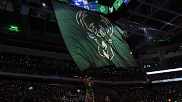 Nov 26, 2023; Milwaukee, Wisconsin, USA;  Milwaukee Bucks mascot Bango waves a flag with the Milwaukee Bucks logo prior to the game against the Portland Trail Blazers at Fiserv Forum. Mandatory Credit: Jeff Hanisch-Imagn Images