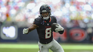 Aug 17, 2024; Houston, Texas, USA; Houston Texans wide receiver John Metchie III (8) runs with the ball after a reception during the game against the New York Giants at NRG Stadium. Mandatory Credit: Troy Taormina-Imagn Images