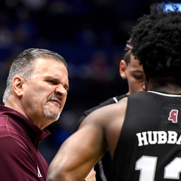 Mar 13, 2025; Nashville, TN, USA;  Mississippi State Bulldogs head coach Chris Jans talks with guard Josh Hubbard (12) against the Missouri Tigers during the first half at Bridgestone Arena. Mandatory Credit: Steve Roberts-Imagn Images