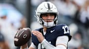 Nov 8, 2025; University Park, Pennsylvania, USA; Penn State Nittany Lions quarterback Ethan Grunkemeyer (17) warms up on the sideline during the third quarter against the Indiana Hoosiers at Beaver Stadium. Mandatory Credit: Matthew O'Haren-Imagn Images