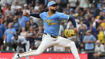 Aug 16, 2024; Milwaukee, Wisconsin, USA; Milwaukee Brewers pitcher Joel Payamps (31) delivers a pitch against the Cleveland Guardians in the ninth inning at American Family Field. Mandatory Credit: Michael McLoone-USA TODAY Sports