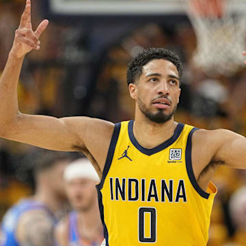 Jun 19, 2025; Indianapolis, Indiana, USA; Indiana Pacers guard Tyrese Haliburton (0) reacts after a play against the Oklahoma City Thunder during the first half of game six of the 2025 NBA Finals between the Oklahoma City Thunder and the Indiana Pacers at Gainbridge Fieldhouse. Mandatory Credit: Kyle Terada-Imagn Images