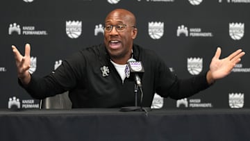 Dec 8, 2024; Sacramento, California, USA; Sacramento Kings head coach Mike Brown talks to media members before the game against the Utah Jazz at Golden 1 Center. Mandatory Credit: Darren Yamashita-Imagn Images