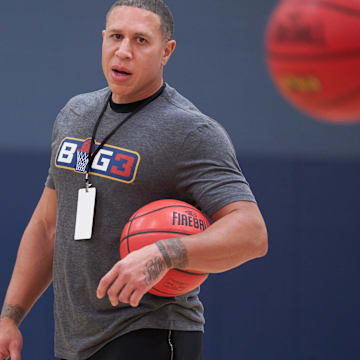 Mar 19, 2022; Scottsdale, AZ, United States; Mike Bibby walks the sidelines while athletes warmup for the BIG3 tryouts at Victorium.

Basketball Big3 Tryouts