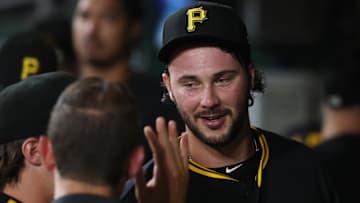 Sep 16, 2025; Pittsburgh, Pennsylvania, USA; Pittsburgh Pirates starting pitcher Paul Skenes (30) high-fives in the dugout after pitching the fourth inning against the Chicago Cubs at PNC Park. Mandatory Credit: Charles LeClaire-Imagn Images