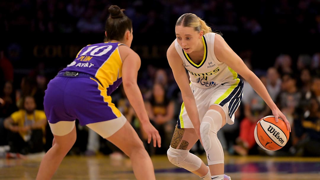 Sep 7, 2025; Los Angeles, California, USA; Los Angeles Sparks guard Kelsey Plum (10) defends Dallas Wings guard Paige Bueckers (5) as she drives to the basket during the first half at Crypto.com Arena. Mandatory Credit: Jayne Kamin-Oncea-Imagn Images Sep 7, 2025; Los Angeles, California, USA; Los Angeles Sparks guard Kelsey Plum (10) defends Dallas Wings guard Paige Bueckers (5) as she drives to the basket during the first half at Crypto.com Arena. Mandatory Credit: Jayne Kamin-Oncea-Imagn Images