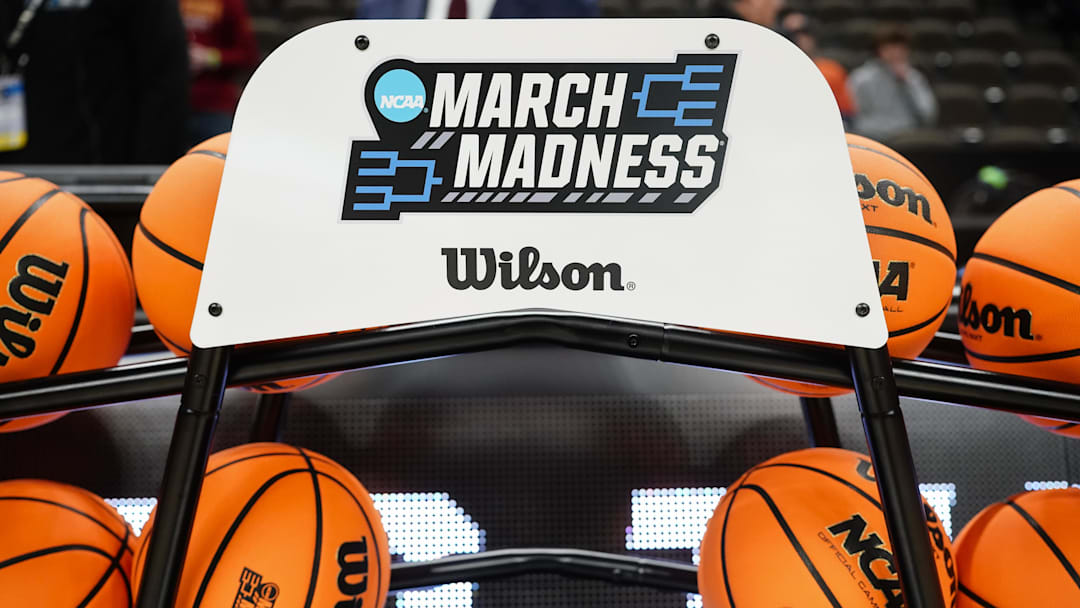 Mar 23, 2024; Omaha, NE, USA; A general view of the NCAA March Madness basketballs, chair, and logo prior to the second round game between the Washington State Cougars and the Iowa State Cyclones in the 2024 NCAA Men’s Tournament at CHI Health Center Omaha. Mandatory Credit: Dylan Widger-Imagn Images