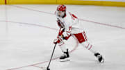Mar 29, 2025; Toledo, OH, USA;  Boston University defenseman Sascha Boumedienne (78) skates with the puck in the second period against the Cornell at Huntington Center. Mandatory Credit: Rick Osentoski-Imagn Images