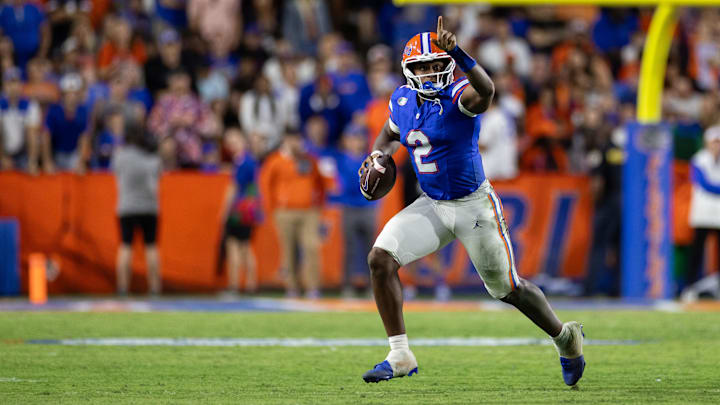 Oct 19, 2024; Gainesville, Florida, USA; Florida Gators quarterback DJ Lagway (2) gestures while running with the ball against the Kentucky Wildcats during the second half at Ben Hill Griffin Stadium. Mandatory Credit: Matt Pendleton-Imagn Images