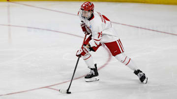 Mar 29, 2025; Toledo, OH, USA;  Boston University defenseman Sascha Boumedienne (78) skates with the puck in the second period against the Cornell at Huntington Center. Mandatory Credit: Rick Osentoski-Imagn Images