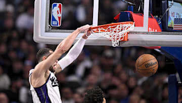 Feb 10, 2025; Dallas, Texas, USA; Sacramento Kings guard Zach LaVine (8) dunks the ball against the Dallas Mavericks during the second quarter at the American Airlines Center. Mandatory Credit: Jerome Miron-Imagn Images
