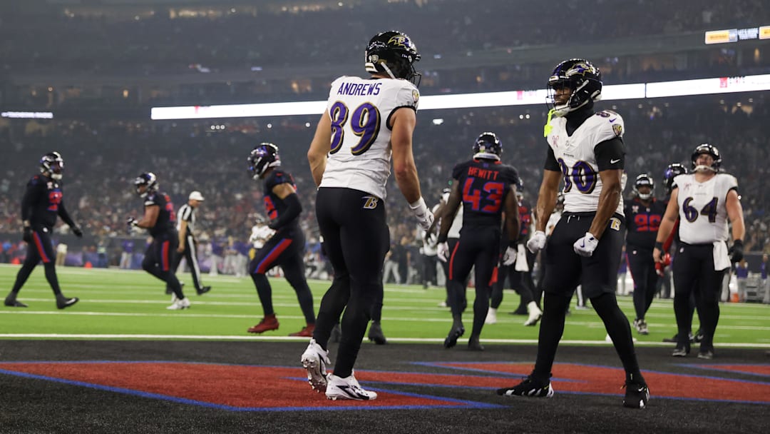 Dec 25, 2024; Houston, Texas, USA; Baltimore Ravens tight end Isaiah Likely (80) celebrates tight end Mark Andrews (89) touchdown reception against the Houston Texans in the second half at NRG Stadium. Mandatory Credit: Thomas Shea-Imagn Images