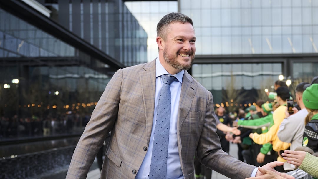 Nov 14, 2025; Eugene, Oregon, USA; Oregon Ducks head coach Dan Lanning high fives fans before a game between the Oregon Ducks and the Minnesota Golden Gophers at Autzen Stadium. Mandatory Credit: Troy Wayrynen-Imagn Images