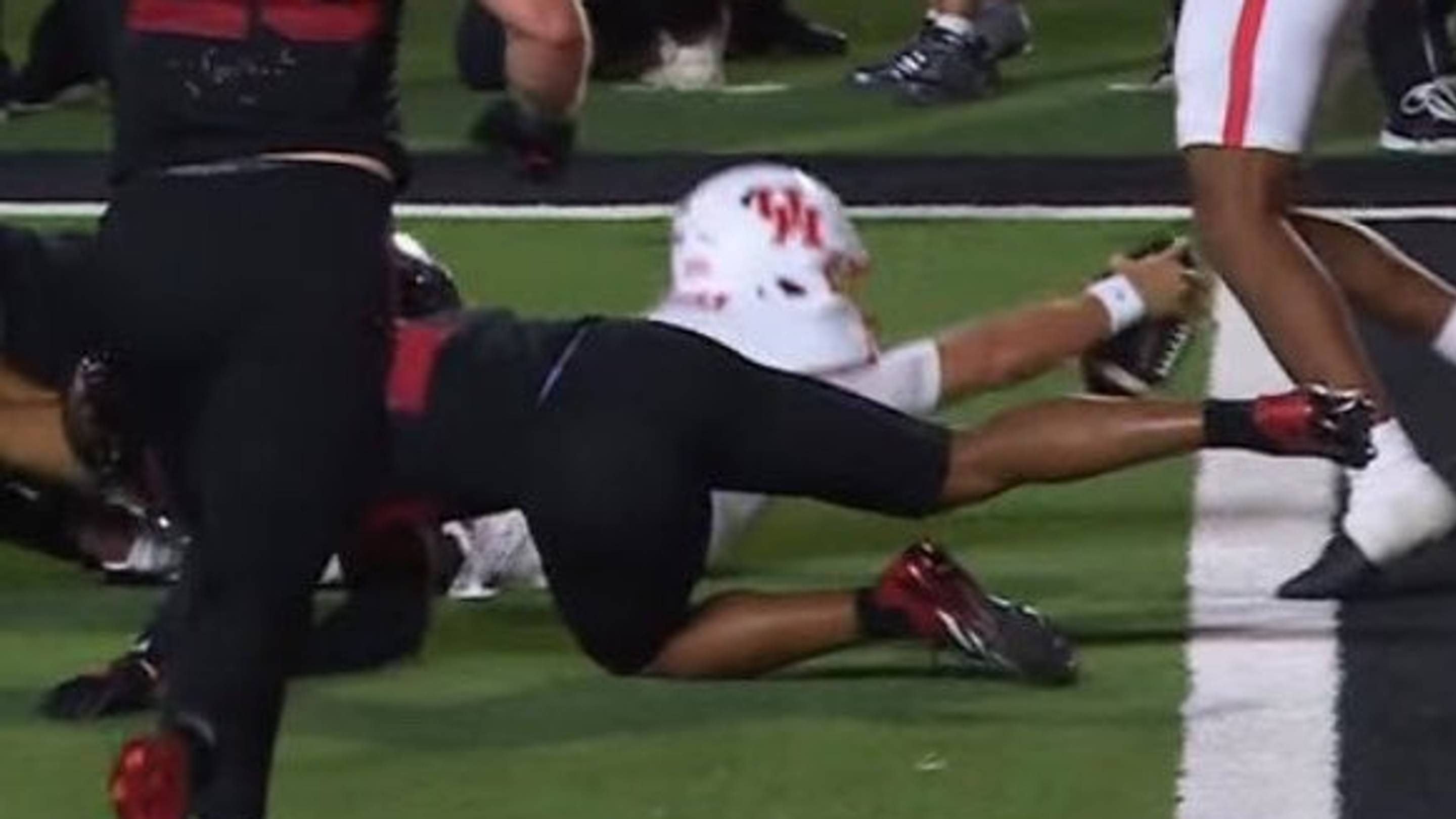 College Football Contender Survives Late Game Scare by Mere Inches