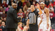 Indiana Hoosiers head coach Mike Woodson and Indiana Hoosiers forward Malik Reneau (5) talk with the referee during the second half against the Winthrop Eagles at Simon Skjodt Assembly Hall.