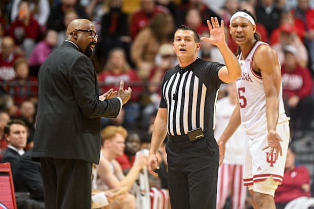 Mike Woodson, Malik Reneau