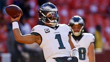 Dec 22, 2024; Landover, Maryland, USA; Philadelphia Eagles quarterback Jalen Hurts (1) warms up before the game against the Washington Commanders at Northwest Stadium. Mandatory Credit: Peter Casey-Imagn Images