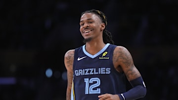 Dec 15, 2024; Los Angeles, California, USA; Memphis Grizzlies guard Ja Morant (12) reacts in the second half against the Los Angeles Lakers at Crypto.com Arena. Mandatory Credit: Kirby Lee-Imagn Images