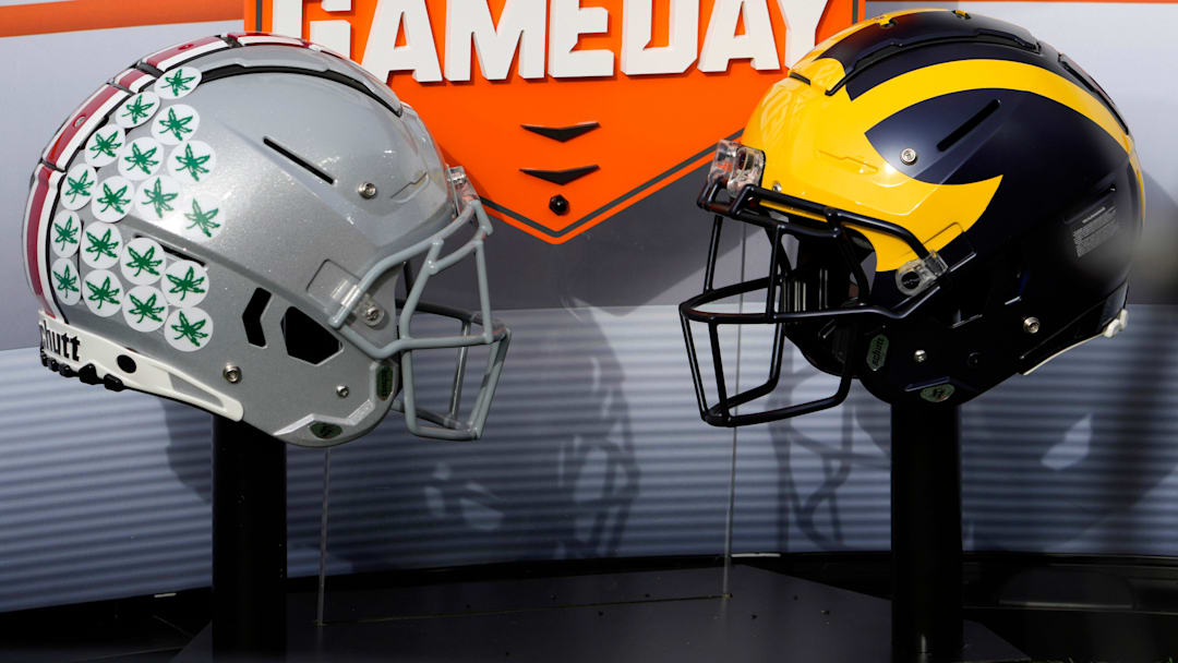 Nov. 25, 2023; Ann Arbor, Mi., USA;
Helmets for the Ohio State Buckeyes and the Michigan Wolverines decorate the on-field set for ESPN  s College GameDay before Saturday  s NCAA Division I football game at Michigan Stadium.