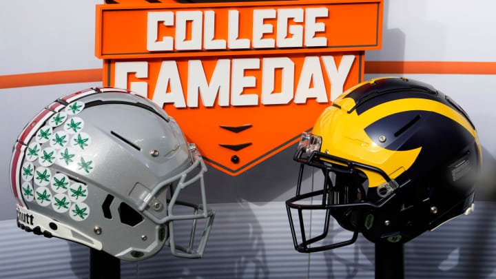 Nov. 25, 2023; Ann Arbor, Mi., USA;
Helmets for the Ohio State Buckeyes and the Michigan Wolverines decorate the on-field set for ESPN  s College GameDay before Saturday  s NCAA Division I football game at Michigan Stadium.