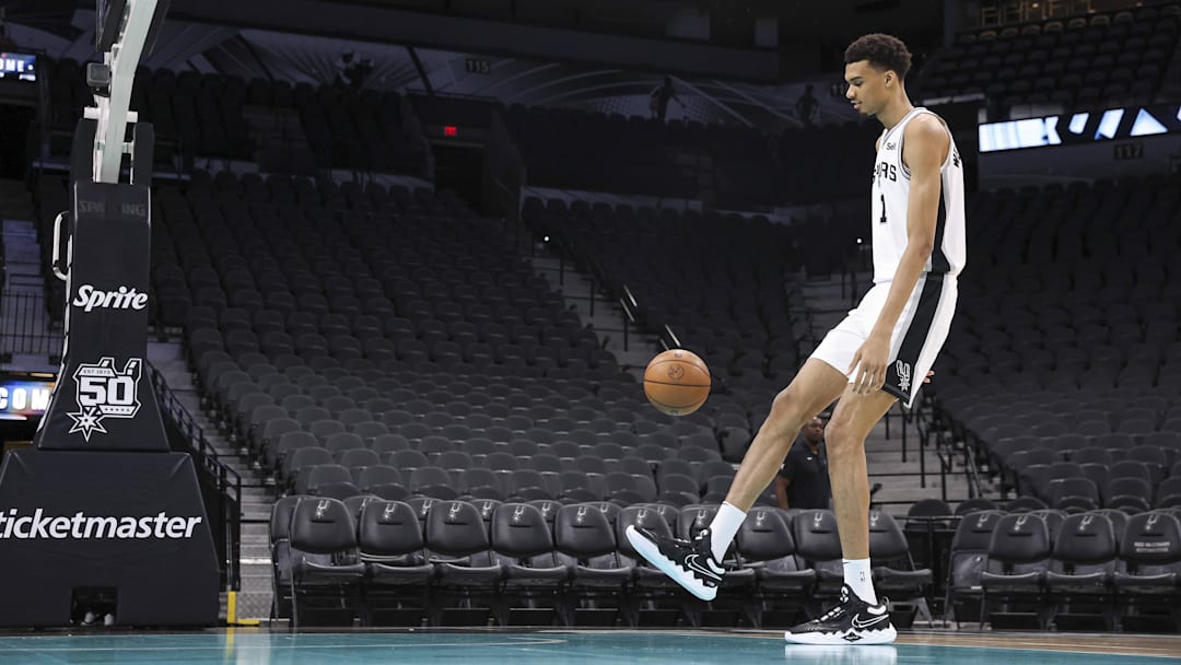 Jun 24, 2023; San Antonio, TX, USA; San Antonio Spurs draft pick Victor Wembanyama shoots around at a press conference at AT&T Center. 